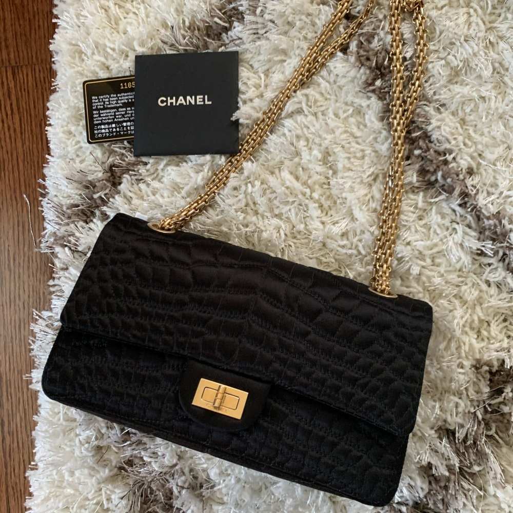 CHANEL Black Quilted Shoulder Bag with Gold Hardware